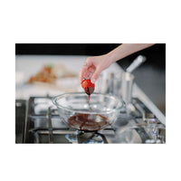 36 Inch Gas Cooktop with 5 Star® Burners, 18,000 BTU Center Burner, Continuous Cast Iron Grates, QuickClean Base®, Electronic Re-Ignition, Sealed Burners, Stainless Steel Surface, and Knob Controls.